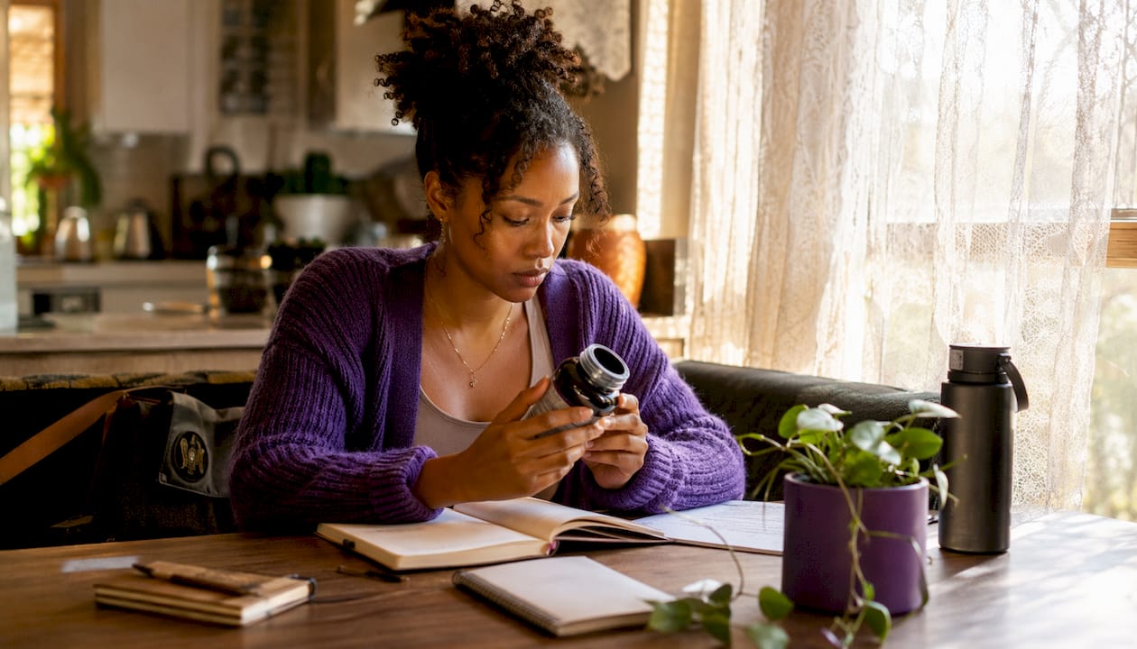 Nutritionist reading mycelium supplement label