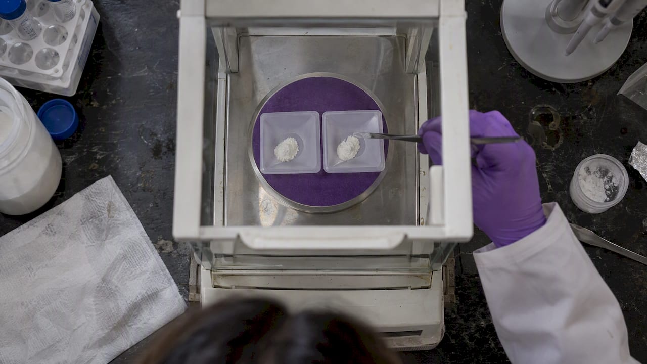 Peptide powder samples on an analytical balance